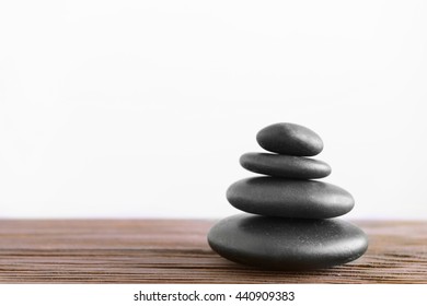 Black Spa Stones On Light Background