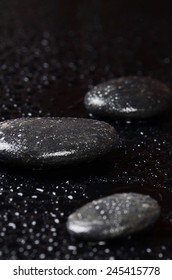 The Black Spa Stones With Water Drops