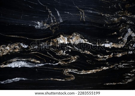 Black spanish matt granite slab with gold blured waved lagoon Belvedere