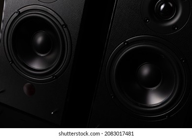 Black Speaker System With Piano Lacquer And Huge Speakers On A Black Background