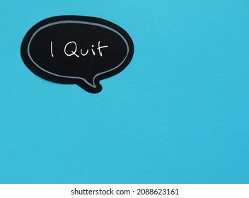 Black Speech Bubble Sticker On Blue Copy Space Background With Handwritten Text I QUIT, Concept Of Decision Making To Quit Job , Leave Workplace, Resign From Full Time Corporate Job Or Quit Bad Habits