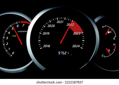 Black speedometer with cutoffs 2022, 2023, 2024. The concept of the new year and Christmas in the automotive field. Counting months, time until the new year