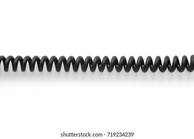 Black spiral cable. Isolated on white