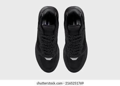 Black Sport Men's Sneakers View From Above. Sports Shoes, Boots For Male Isolated On White Background. Footwear, Running Training Basketball Shoes, Flat Lay