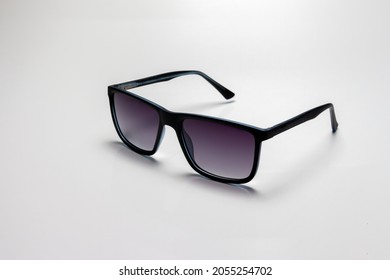 Black Sports Glasses On White Background. Side View. Space For Text.