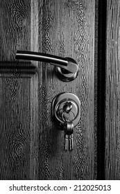 Black Steel Door With Wood Texture