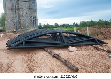 Black Steel Roof Trusses Laid On The Ground.