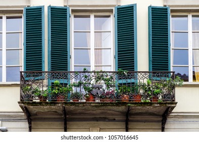 Black Steel Terrace Full Of Flowers And Plants In Pistoia, Province Of Pistoia, Tuscany, Italy.