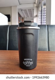 Black Steel Tumbler Coffee On Brown Table