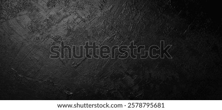 Black stone background. Black surface. Top view. Free space for your text.