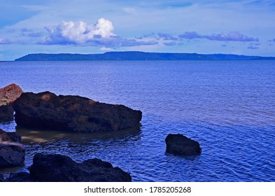 Black Stone With Blue Sea And Blue Sly In The Morning