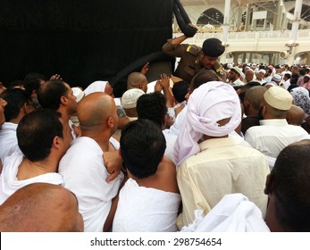 The Black Stone And The Policeman . Taken On June 14.2015 . In Mecca, Saudi Arabia.