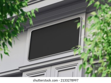 Black storefront on a grey shop frontage Mockup. Empty store brand signboard frame in street - Shutterstock ID 2133278997