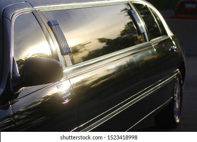 black stretch limo at dusk - Powered by Shutterstock