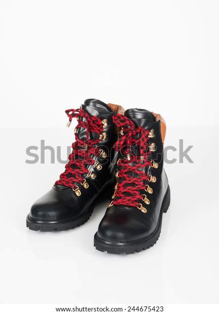 black boots with red laces