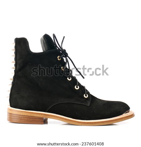 Black suede boot with shoelace isolated on white background.