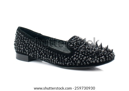 Black suede shoe isolated on white background.