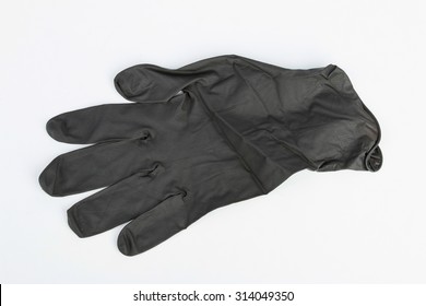 Black Surgical Latex Glove. Stock Image Macro.