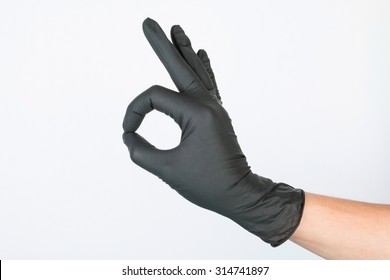 Black Surgical Latex Glove. Stock Image Macro.