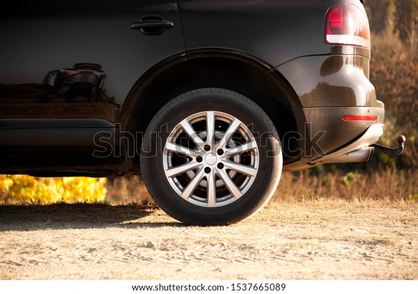 black suv car tyre\
isolated. car tyre
