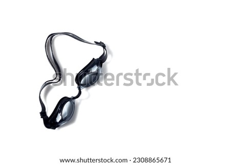Black swimming glasses isolated on white background