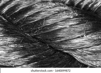 Black Synthetic Fiber Cable In Monochrome