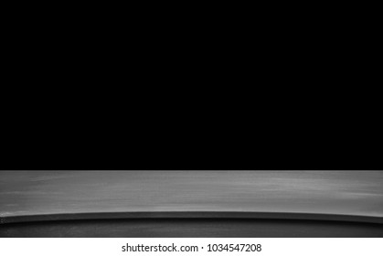 Black Table Top Isolated On Black Background.