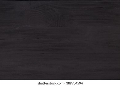 Black table top view of the artist. Empty wooden bench for creative work. Creative minimalism, simplicity and convenience. Minimalist style