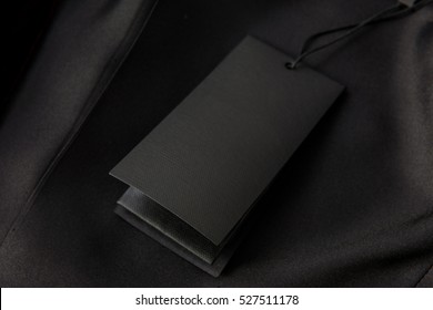 Black Tag On The Black Dress