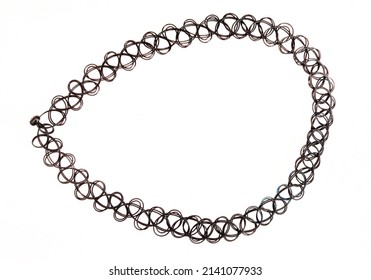 
					Black tattoo choker necklace, 90’s neck choker, isolated on white background
					