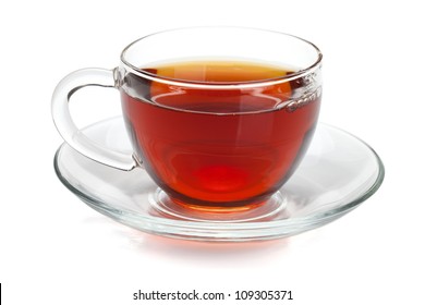 Black tea in glass cup. Isolated on white background