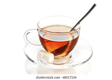 Black Tea In Glass Cup With Teaspoon And Sugar Cubes  Isolated On White