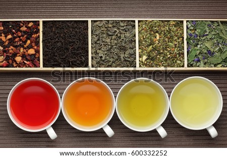Black tea, green tea, fruit tea cups / tea assortment in boxes