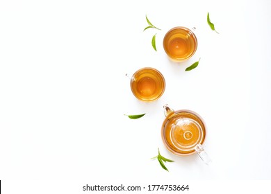 Black Tea, Green Tea In A Glass Teapot With Tea Leaves. Top View