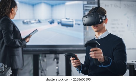 Black Teacher with Tablet Giving Advice to Student in Virtual Reality Headset, Uses VR Technology and Prototyping in CAD Software with Controllers. Futuristic University and Augmented Reality Concept - Powered by Shutterstock