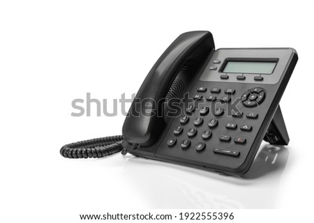 black telephone with VOIP isolated on white background. customer service support, call center concept.