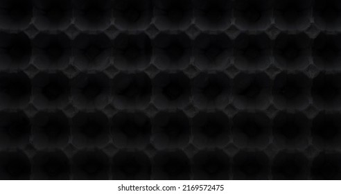 Black Texture Of Pyramid Acoustic Foam Tile. Studio Sound Treatment Accessories Carton.Black Egg Carton Surface. Dark Wall Panel 