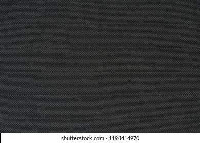 Black Texture Of Synthetic Fabric. Textile Background.