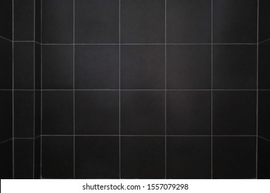 Black Tile Wall In Bathroom
