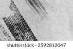 Black tire marks on road, Black rubber tire marks and tread marks, Tire trace track wheels texture and background, Auto tire tread grunge, Car wheel tyre tread track black tyre print, Top view.