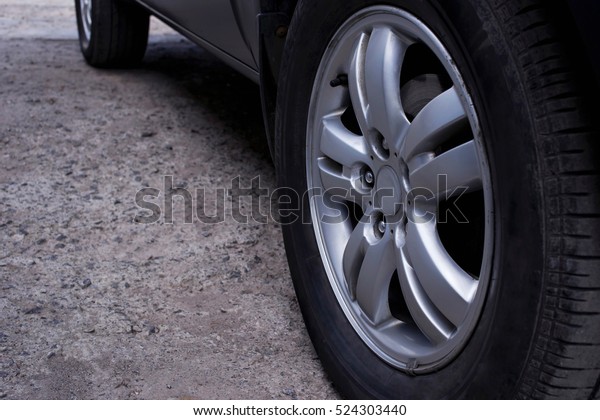 the black tires on a car\
disk