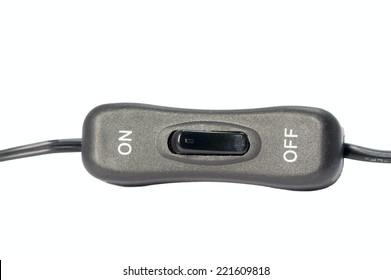 Black toggle switch on black surface - on off