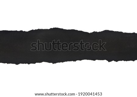 Black torn paper isolated on white background close-up. View from above. Detail for design. Design elements. Macro.