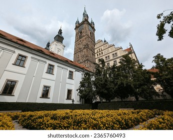 Black Tower and Church of Virgin Mary's Immaculate Conception in Klatovy, old town main square with fountain and column,Bohemia,Czechia
