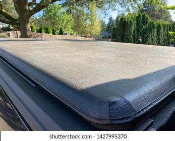 Black Truck Bed Tonneau Cover.