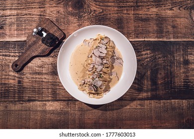 Black Truffle Pasta With, Butter, Lemon, Confit And Chives.