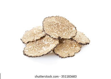 Black truffle slices heap isolated on white, clipping path included