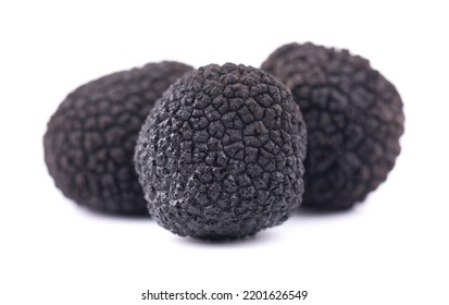 Black truffles isolated on a white background. Fresh sliced truffle. Delicacy exclusive truffle mushroom. Piquant and fragrant French delicacy. Clipping path - Shutterstock ID 2201626549