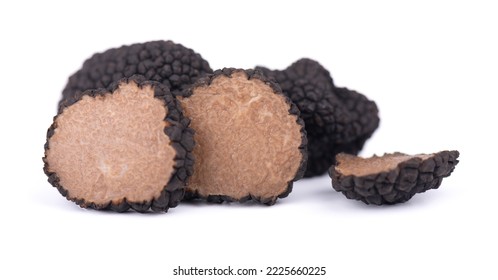 Black truffles isolated on a white background. Fresh sliced truffle. Delicacy exclusive truffle mushroom. Piquant and fragrant French delicacy. Clipping path. - Shutterstock ID 2225660225