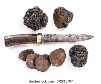 Black Truffles Isolated On A White Background.